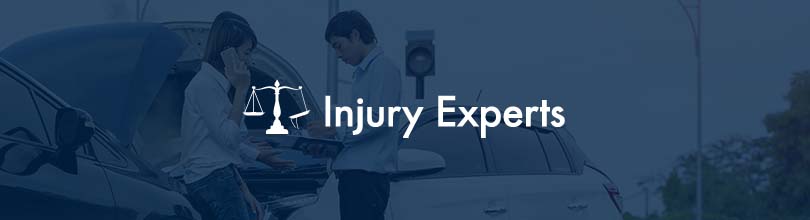 Injury Expert logo with two people in car accident