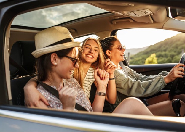 girls driving car