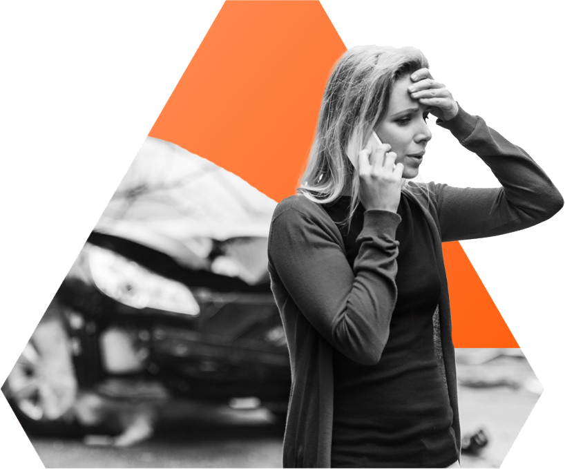 woman on phone after car accident